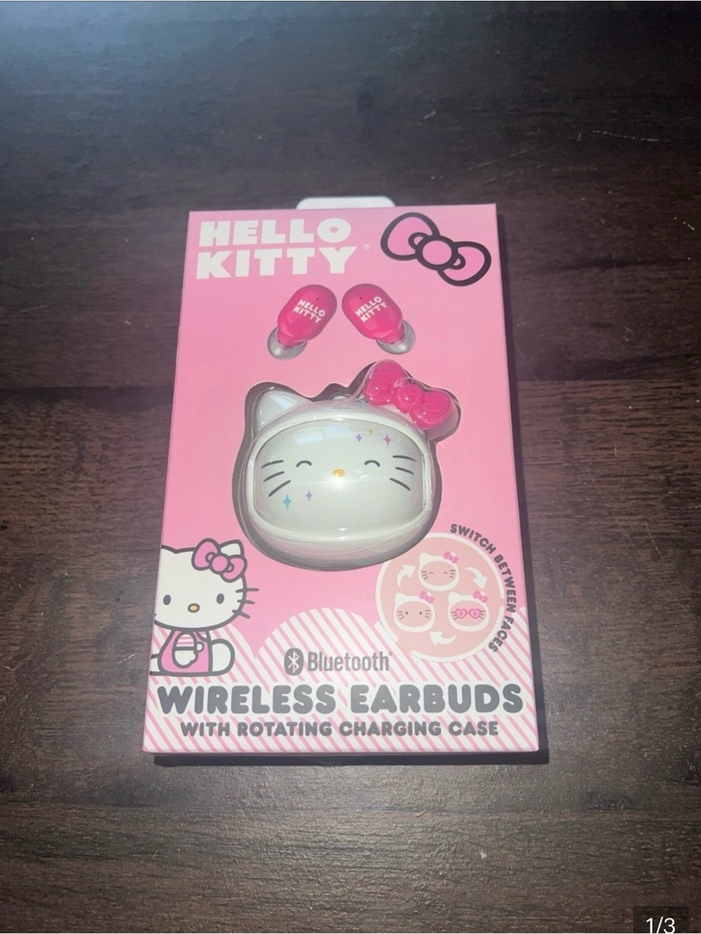 Hello Kitty Pink and White Bluetooth Earbuds with Cat-Shaped Rotating Case